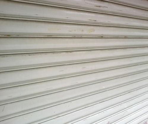 解构造大港区保温卷帘门维修难题 厂家直销与天津建材全解读